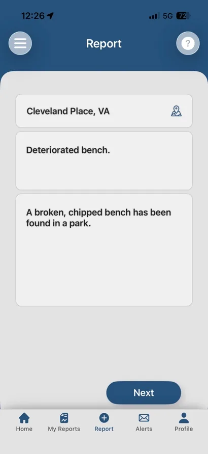 App de ARGUS: primer paso de un reporte nuevo, con la ubicación, un título y una descripción.